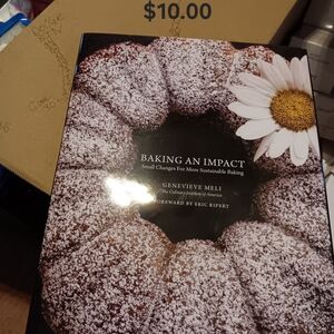 Baking an Impact Cookbook by Genevieve Meli - Black and White